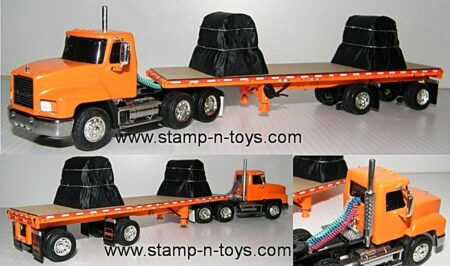 snt0179 Mack Daycab pulling a 37' Flatbed w/two steel coil load